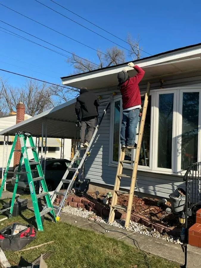 Restoration crew performing exterior repair in Niskayuna
